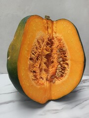 Fleshy yellow fruit with its seeds