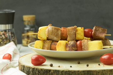 Fried meat with vegetables on an open fire, Food background with copy space