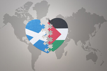 puzzle heart with the national flag of palestine and scotland on a world map background.Concept.