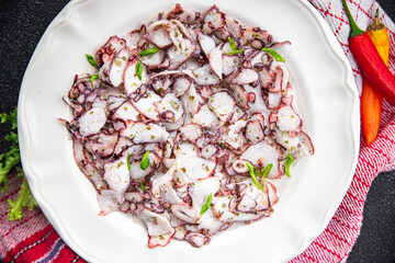 carpaccio octopus salad seafood marinated spicy meal food snack on the table copy space food...