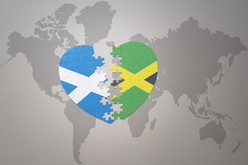 puzzle heart with the national flag of jamaica and scotland on a world map background.Concept.