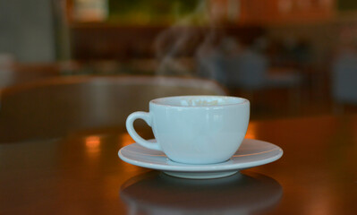 Hot coffee in a drinking glass