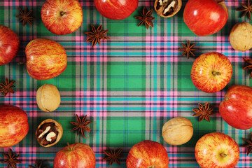 Bright ripe apples forming autumn mood background for design and decoration