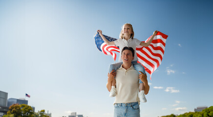 Patriotic holiday, family with American flag