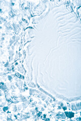 The texture of water on a white background in bright sunlight.