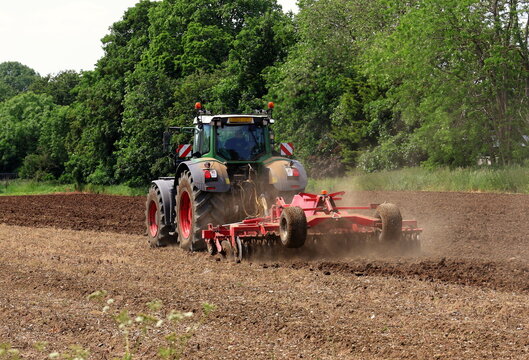 Tractor Tilling a Field