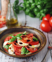 A bowl with traditional Italian caprese salad