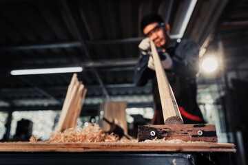 The process of creating snooker cue sticks with handmade work, skilled carpenters create snooker cue sticks, handmade work. Choosing to focus on the picture in only some details.