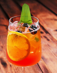 Aperol Spritz with ice on the table close up
