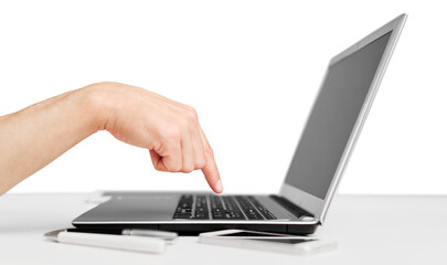 Man hand working on a laptop with blank screen monitor