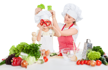 Mother and Daughter Having Fun in the Kitchen Isolated
