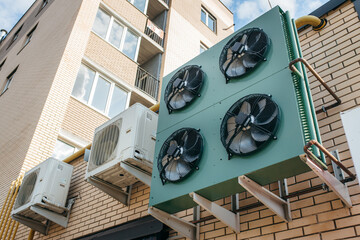 Air conditioners on wall of house  - obrazy, fototapety, plakaty