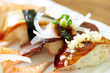 Different types of sushi on a plate