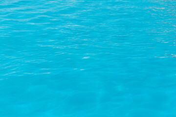 Blue clear pool water abstract reflection wave surface background clean wet