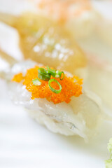 Different types of sushi on a plate