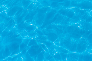 Blue clear pool water with abstract pattern of reflection and wave surface clean transparent background