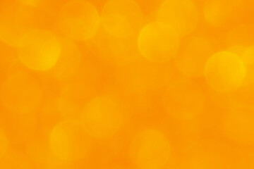 Golden yellow glitter bokeh texture background. New Year, Christmas and all celebration background concepts.