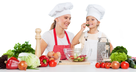 mother and daughter prepare salads