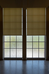 Interior view of art deco grand windows with blinds