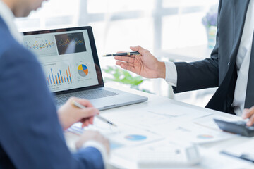 Businessman discussing commercial real estate sector faces risks as financial.