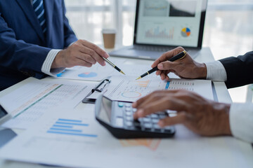 Businessman discussing commercial real estate sector faces risks as financial.	