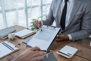 Businessman discussing commercial real estate sector faces risks as financial.