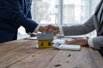 Businessman discussing commercial real estate sector faces risks as financial.