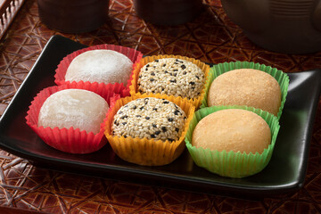 Dish with a variation of traditional Japanese Mochi close up 