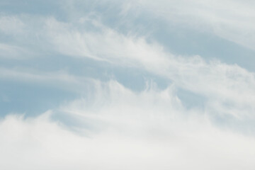 White clouds with shapes on a blue sky