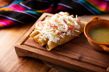 Tacos Dorados. Mexican dish also known as Flautas, consists of a rolled corn tortilla with some filling, commonly chicken or beef or vegetarian options such as potatoes.