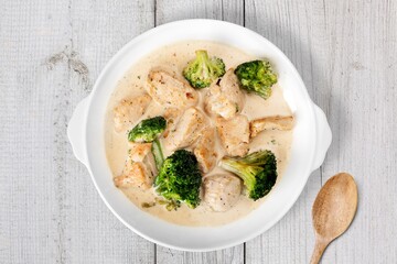 Tasty Chicken stew with vegetables and green herbs.