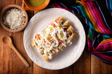 Tacos Dorados. Mexican dish also known as Flautas, consists of a rolled corn tortilla with some filling, commonly chicken or beef or vegetarian options such as potatoes.