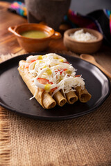 Tacos Dorados. Mexican dish also known as Flautas, consists of a rolled corn tortilla with some filling, commonly chicken or beef or vegetarian options such as potatoes.