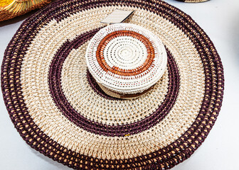 Place mat and basket made of natural fiber (Chambira palm) - traditional handicrafts of Huaorani ...