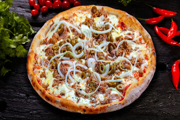 Mozzarella pizza, olives, onion, tomato sauce and shredded meat