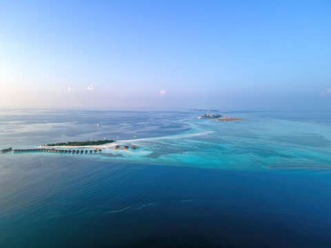 An aerial view of Makunufushi (front) and Maafushi (back) islands, Maldives
