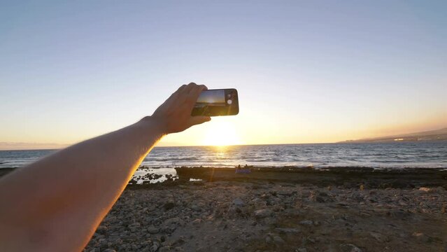 Taking picture of the beach in Tenerife island in Spain in 4k slow motion 60fps