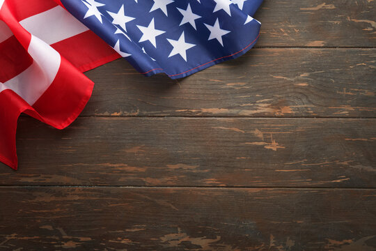 4th of July American Independence Day. American flag on black old rustic wooden background with copy space. Close Up for Memorial Day, Happy Martin Luther King jr day. Top view. Copy space. Mock up.