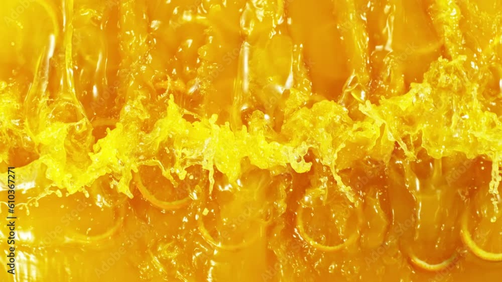 Poster Super Slow Motion of Splashing Orange Juice. Filmed on High Speed Cinema Camera, 1000 fps. Abstract Liquid Background with Orange Slices.