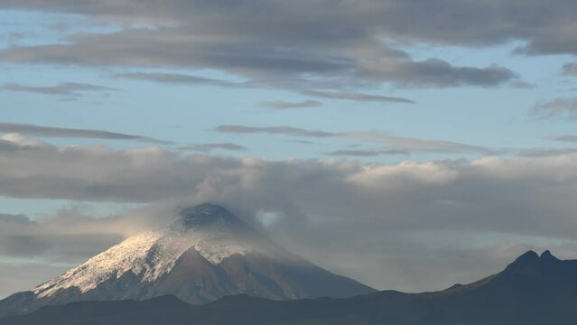 Time lapse of heavy volcanic activity of the Cotopaxi volcano with ash clouds and smoke seen from Quito, Cotopaxi national park, Ecuador. June 3rd, 2023.