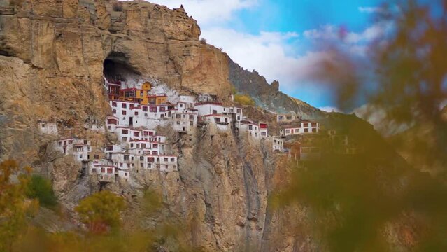 Phugtal Gompa during the autumn season at Zanskar in Ladakh, India. Monastery built on a cave inside the mountains about 2500 years ago. View of monastery inside the mountain in Zanskar at autumn. 