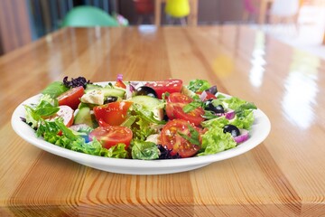 Healthy tasty green salad with vegetables