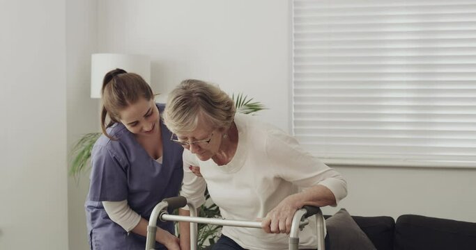 Old woman, walker or caregiver helping in rehabilitation or retirement clinic for wellness or support. People, nurse or elderly patient with walking frame in physical therapy recovery or nursing home