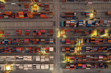 Top viewContainer ship loading and unloading in sea port, Aerial view of business logistic import and export freight transportation by container ship in harbor,  loading Cargo freight ship, Dubai