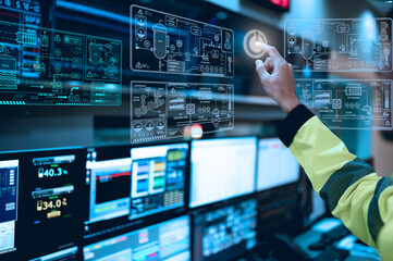 Engineer working at control room,Manager control system,Technician man monitoring program from a...