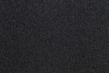 Black sandpaper texture - obrazy, fototapety, plakaty