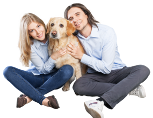 Happy couple holds their beautiful dog