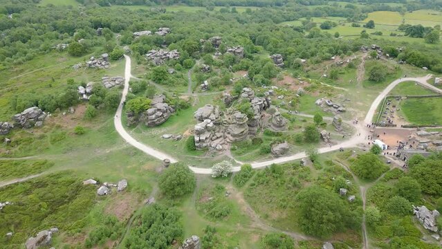 This aerial drone video shows the Brimham Rocks which are ancient rocks in Yorkshire Dales National Park, England. 