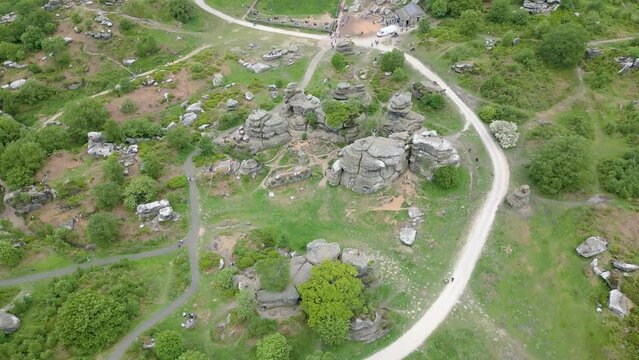 This aerial drone video shows the Brimham Rocks which are ancient rocks in Yorkshire Dales National Park, England. 