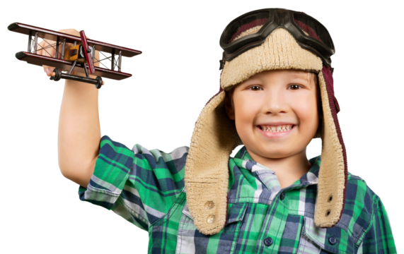 Happy kid playing with a toy airplane